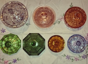 Just a small selection of the myriad colours and forms found in vintage glass trinket boxes.